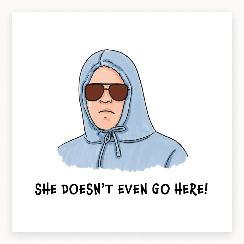 The card lying flat. Card with illustration of a person in a blue hoodie and sunglasses, text 'SHE DOESN'T EVEN GO HERE!' in bold.