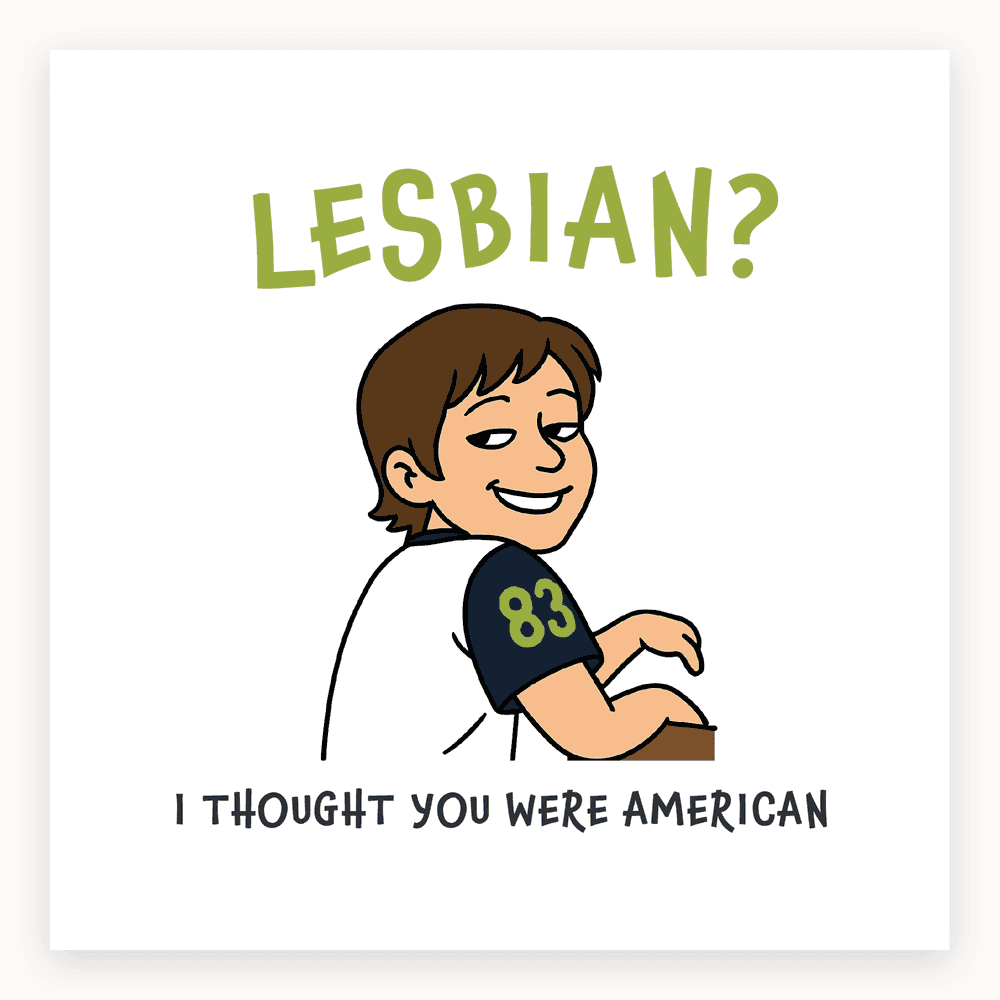 The card lying flat. Illustrated card with a cartoon character smirking, text 'LESBIAN?' above and 'I THOUGHT YOU WERE AMERICAN' below, in white and brown.