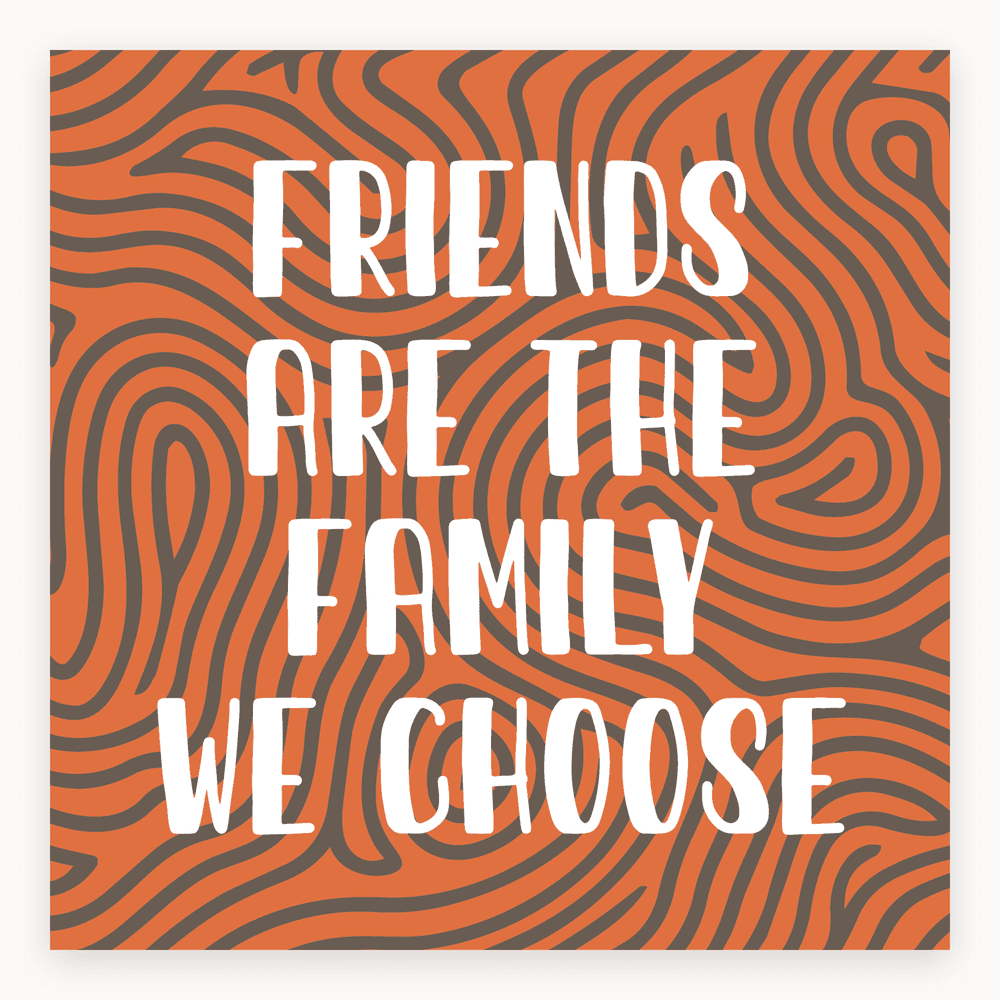 The card lying flat. Card with 'Friends are the family we choose' text on an orange wavy background.
