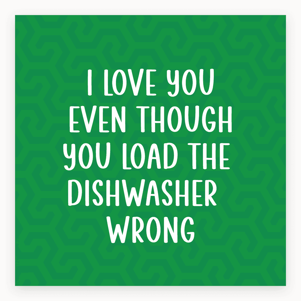 The card lying flat. Green card with white text saying 'I love you even though you load the dishwasher wrong'. Modern design.