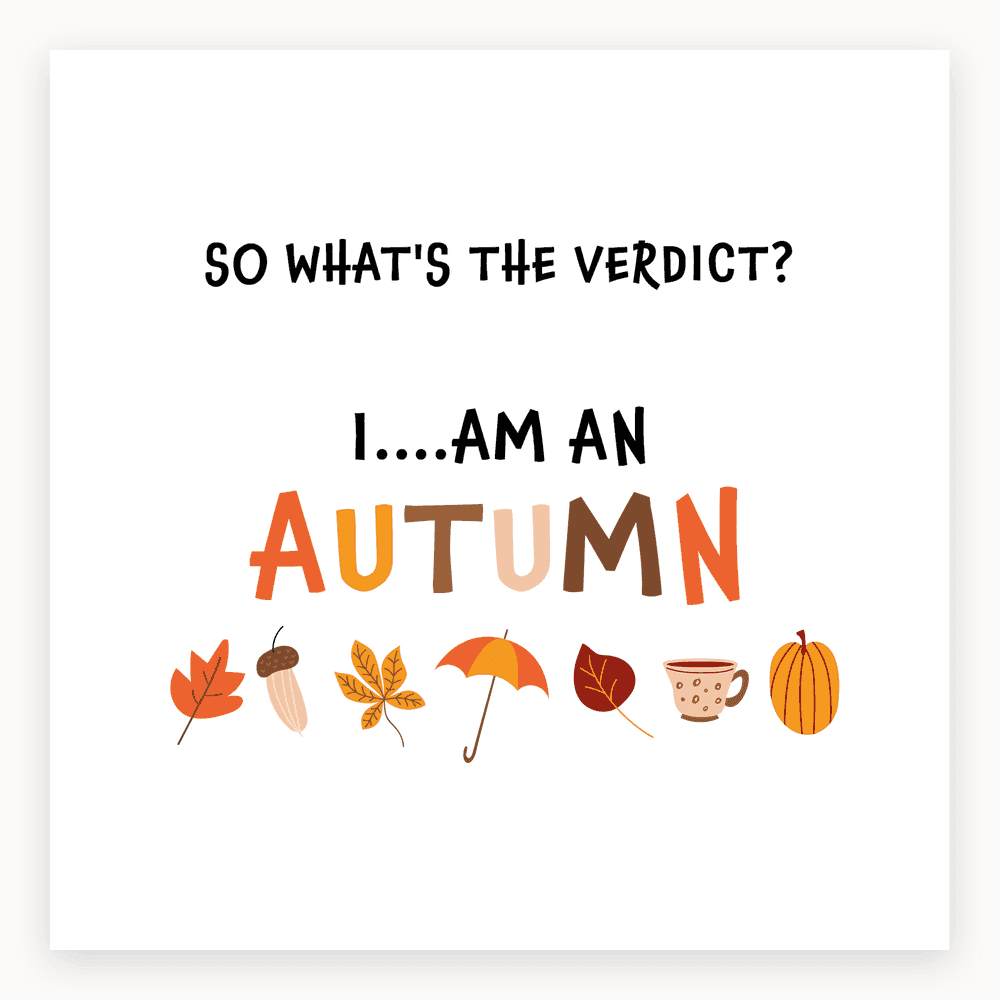 The card lying flat. Card with autumn-themed illustrations: leaves, acorn, umbrella, cup, pumpkin. Text reads 'SO WHAT'S THE VERDICT? I....AM AN AUTUMN'.